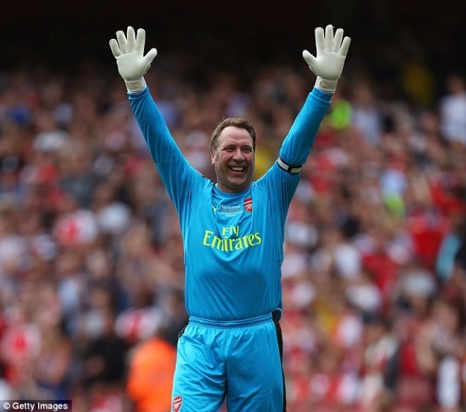 Goalkeeper David Seaman is all smiles as he celebrates the opening goal for Arsenal