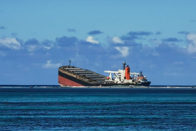 The MV Wakashio bulk carrier vessel, operated by Mitsui OSK Lines Ltd., sits partially submerged in the ocean after running aground close to Pointe d'Esny, Mauritius, on Friday, Aug. 14, 2020. Kamlesh Bhuckory—Bloomberg/Getty Images