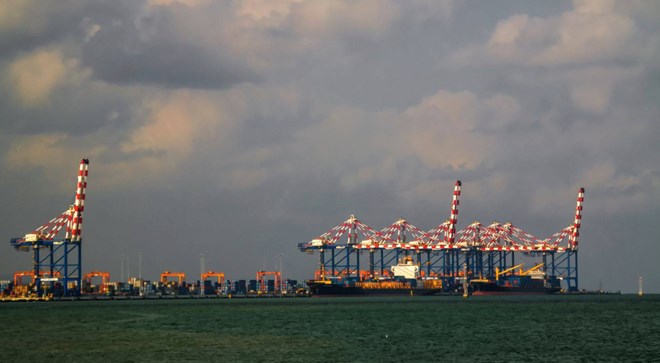 Panorama of Djibouti port with ships and cargo crane - Credit: homocosmicos/AdobeStock