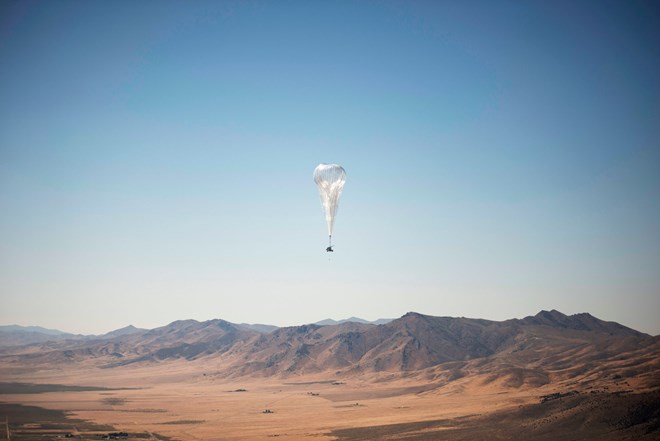 A Loon internet balloon, carrying solar-powered mobile networking equipment over the company's launch site in Winnemucca, Nev. The balloons started delivering internet access to Kenya on Tuesday.Credit...Loon LLC