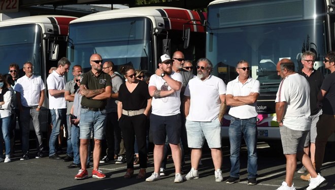 Bus drivers in Bayonne, southwestern France, wait for a visit by the junior transport minister on Tuesday, two days after a colleague was attacked for refusing to let a passenger board without a mask. Photo: AFP