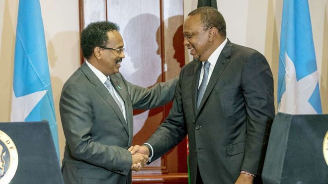 Kenya's President Uhuru Kenyatta with the President of Somalia Mohamed Farmaajo (left). FILE PHOTO | PSCU
