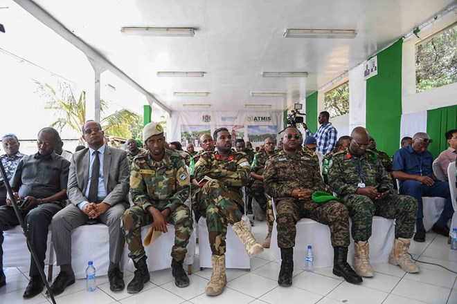 Military and civilian officers during the official handover of Maslah Forward Operating Base (FOB) in Mogadishu, Somalia, on 21 January 2023. ATMIS Photo / Mukhtar Nuur