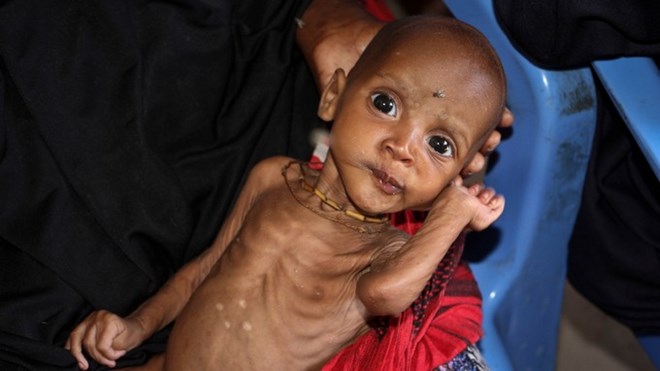 When does an urgent food crisis become a famine?