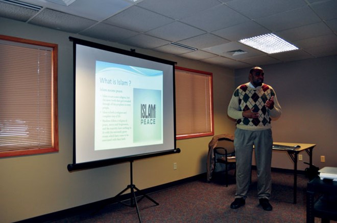 Mohamed Duale, community services technician for Eden Prairie, speaks to a group about Muslim beliefs and Somali culture Nov. 30 at the Senior Center in Eden Prairie. (Sun Current staff photos by Michelle Doeden)
