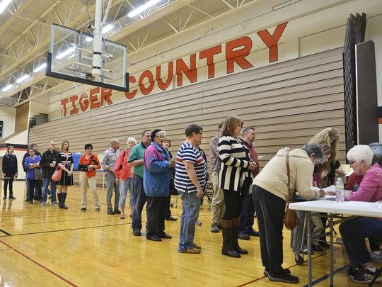 Voters wait in line in the St. Cloud Tech gymnasium just after 5 p.m. Nov. 3 to cast their ballots to decide the outcome of the $167 million District 742 school referendum. (Photo: Kimm Anderson, kanderson@stcloud)