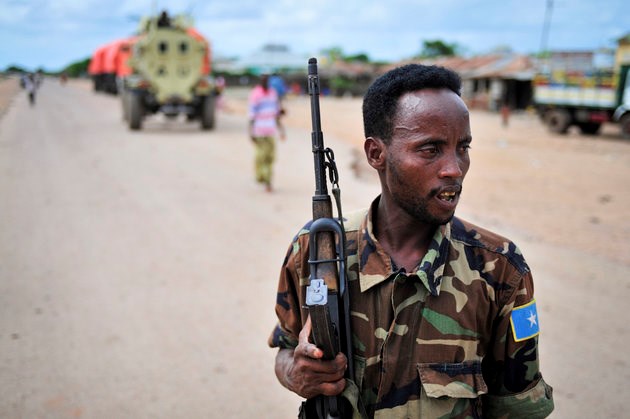 A Somali soldier patrols a town captured from al Shabab. The Islamist militant group is trying to disrupt Somalia’s political transition in 2016. (REUTERS/TOBIN JONES/AU-UN IST PHOTO/HANDOUT)