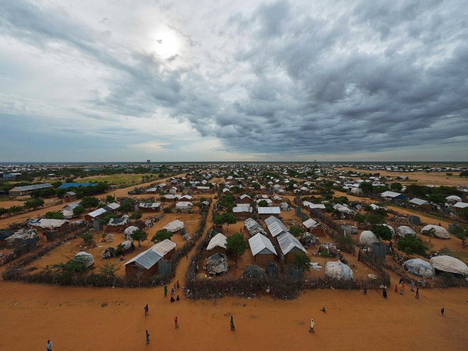 Dadaab was setup in 1991 to hold 80,000 refugees from the Somali civil war. But new residents joined them, from Somalia, Sudan, Congo, Ethiopia, Uganda and Rwanda, until Dadaab — now at nearly half a million people — became "a giant cosmopolitan city made of mud tents and thorns."