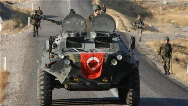 Turkish soldiers patrol along a road in the southeastern province of Sirnak. (file photo)