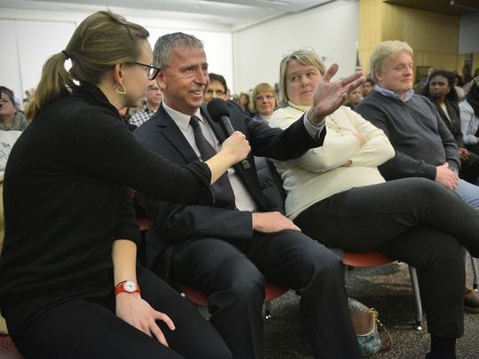 St. Cloud Mayor Dave Kleis smiles as he talks about the things the city has done to address issues of tension and try to improve relationships with the immigrant community during the MPR News-sponsored "Muslims in Minnesota" community conversation Thursday night at the St. Cloud Public Library. (Photo: Kimm Anderson)