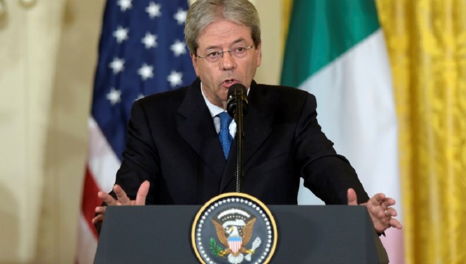 Italian Prime Minister Paolo Gentiloni urged western officials on Thursday not to let China overrun Africa, and said more needs to be done by America and Europe to help the continent develop. (AP Photo/Susan Walsh)