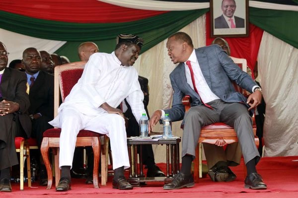 Uhuru Kenyatta and Raila Odinga at a past event. FILE PHOTO | NATION MEDIA GROUP