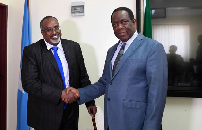 Ambassador Francisco Madeira, the Special Representative of the Chairperson of the African Union Commission (SRCC) for Somalia, shakes hands with Mohamed Abdi Waare, the President of Hirshabelle State of Somalia, in Mogadishu, on 2 February 2019. AMISOM Photo / Omar Abdisalan