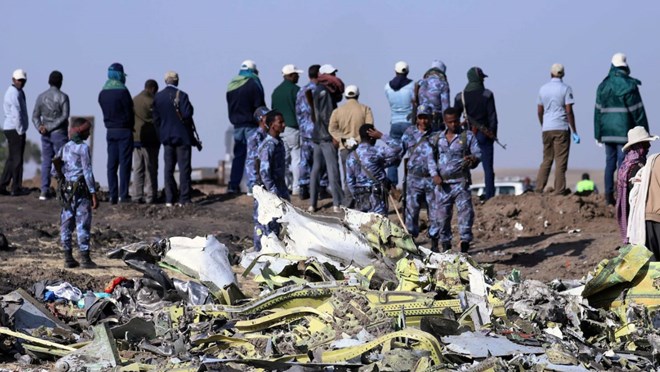 Police at the scene of the Ethiopian Airlines Flight ET 302 plane crash, near the town of Bishoftu, Ethiopia. Reuters